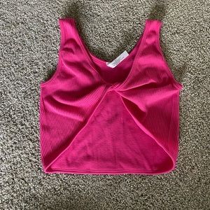 Hot pink crop top.